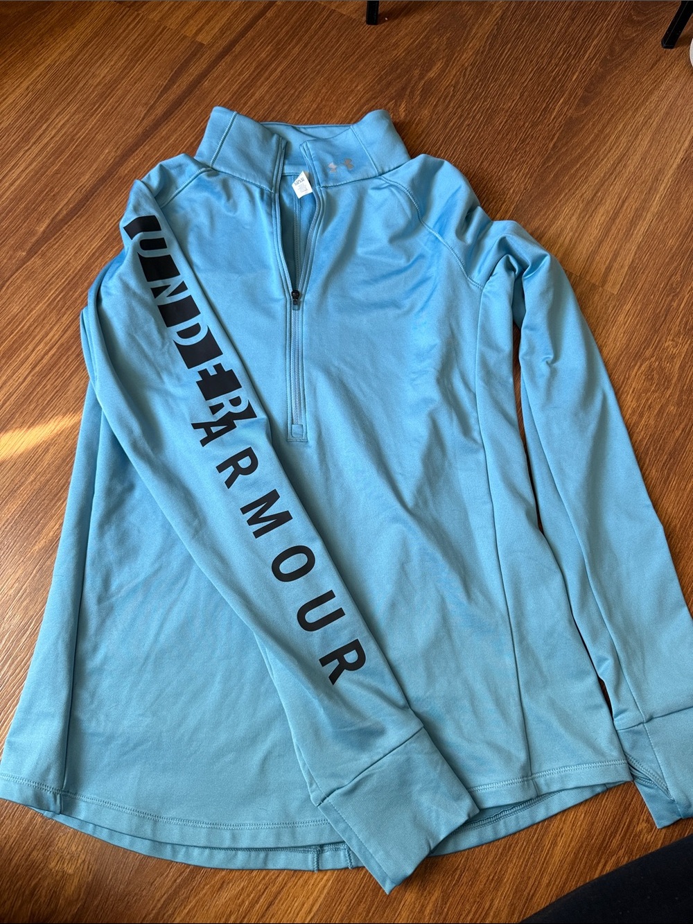 Under Armour Sky Blue Half-Zip Pullover with Black Sleeve Logo